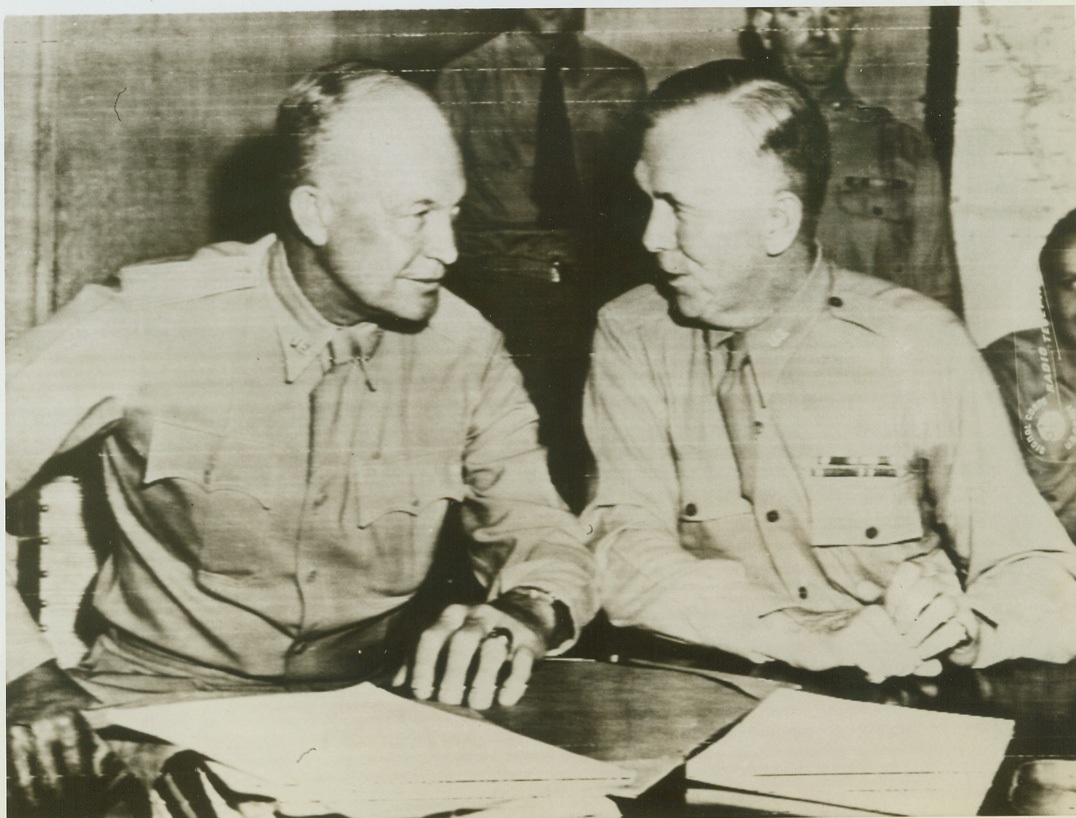 MARSHALL AND EISENHOWER CONFER, 6/5/1943. NORTH AFRICA – General George C. Marshall, U.S. Army Chief of Staff, is shown conferring with General Dwight Eisenhower (left), Allied Commander in Chief, during an informal press conference held at Allied Headquarters in North Africa. Gen. Marshall accompanied British Prime Minister Winston Churchill to North Africa from Washington. Credit: Signal Corps photo via OWI Radiophoto from ACME;