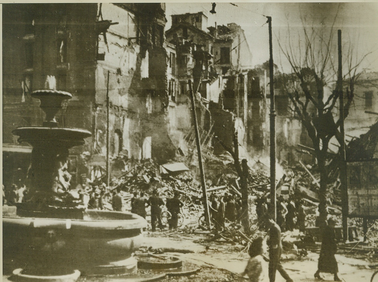 “City of the Dead”, 9/10/1943. Milan – Suffering heavily from bombing attacks by the Allies, Milan was described as “a city of the dead, without gas, water or electricity.” This photo, received through a neutral source, shows wreckage in the Piazza Fontana of the industrial city. Credit: (ACME);