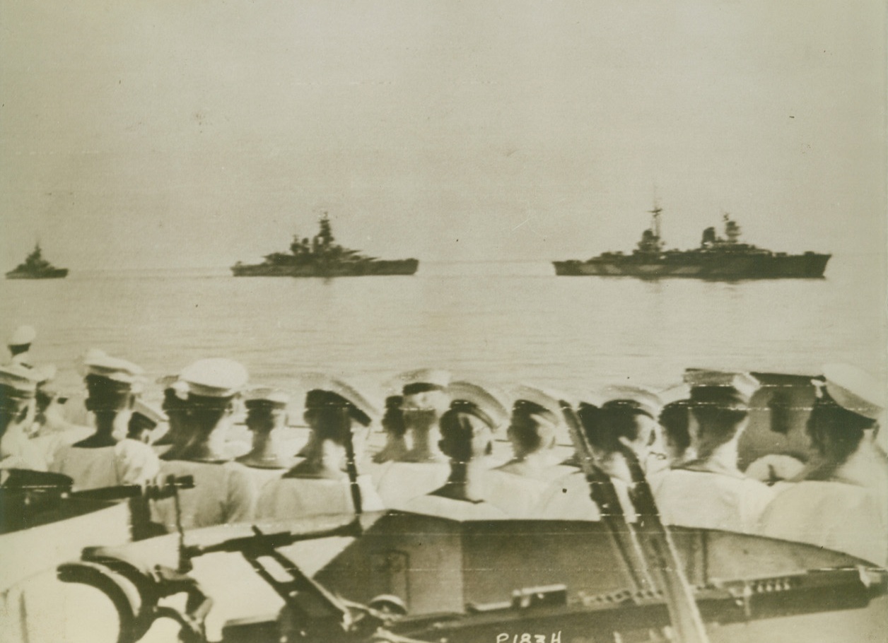 ITALIAN FLEET ON WAY TO SURRENDER, 9/13/1943. This photo, flashed to the U.S. today by radiotelephoto, shows three ships of the Italian Navy as they passed the British battleship H.M.S. Warspite, (in foreground), on their way with other units of the fleet to Valetta, Malta, to surrender to the Allies after having escaped from Italy. Left to right, the vessels are: the battleships Italia and Vittorio Veneto, and the cruiser Savoia (flagship).Credit: U.S. Signal Corps radiotelephoto from Acme;