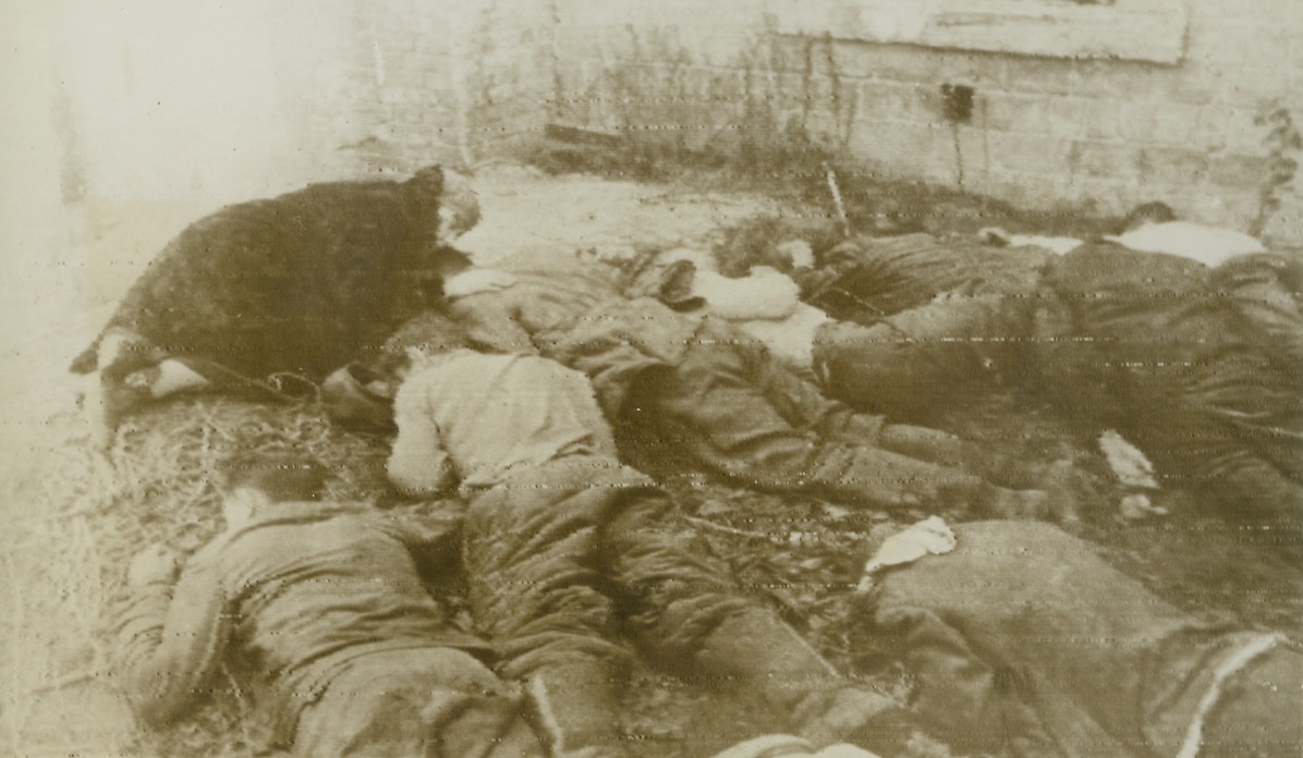 A Mother Mourns, 11/12/1943. Kiev, U.S.S.R. – Kneeling on the frozen ground and clasping the body of her dead son to her, a mother of Kiev mourns the death of her child, who was not alone in death. The youths shown here, lying with their faces to the ground, were among civilians shot by cold-blooded Nazis before the invaders were driven from Kiev.Credit: ACME Radiophoto;