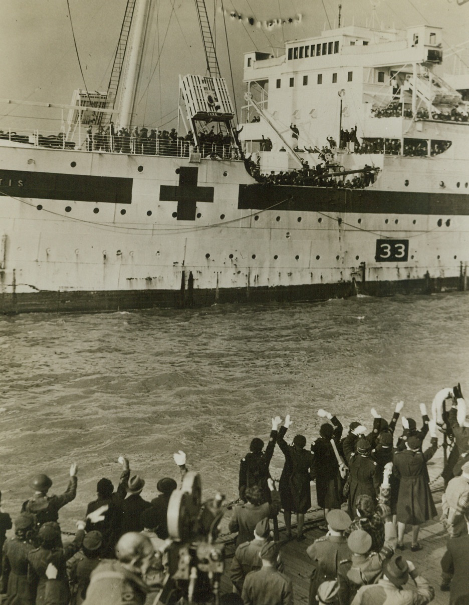 Freed from Nazi Prisons, 11/7/1943. Northwest England -- Even the blind crowd to the rails of the Atlantis, as the ship brings the third load of repatriated Allies from Germany to a northwest England port. The more seriously wounded men  made the trip from Germany. Credit: ACME;