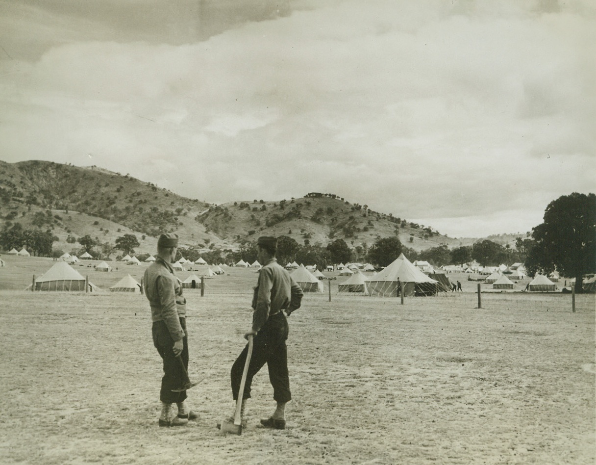 Aussie Farm Site now Tent City for U.S. Troops, 5/13/1942. Australia – A peaceful farm site becomes  a city of tents as recently arrived American troops put up their canvas homes in the land down under. Credit line (ACME);