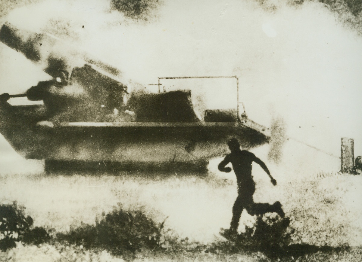 German Gun Fires in Crimea, 8/13/1942. On the Southern Russian Front—This photo from a German source shows, according to the caption which accompanied the picture, a giant Nazi gun of a secret new type, firing in the Crimea. The gun was first used in the capture of Sevastopol and is said to fire a shell weighing several hundredweights. It is believing that the weapon is an improvement of the Skoda 12-inch mortar used in the last war. (Passed by censors). Credit: ACME.;