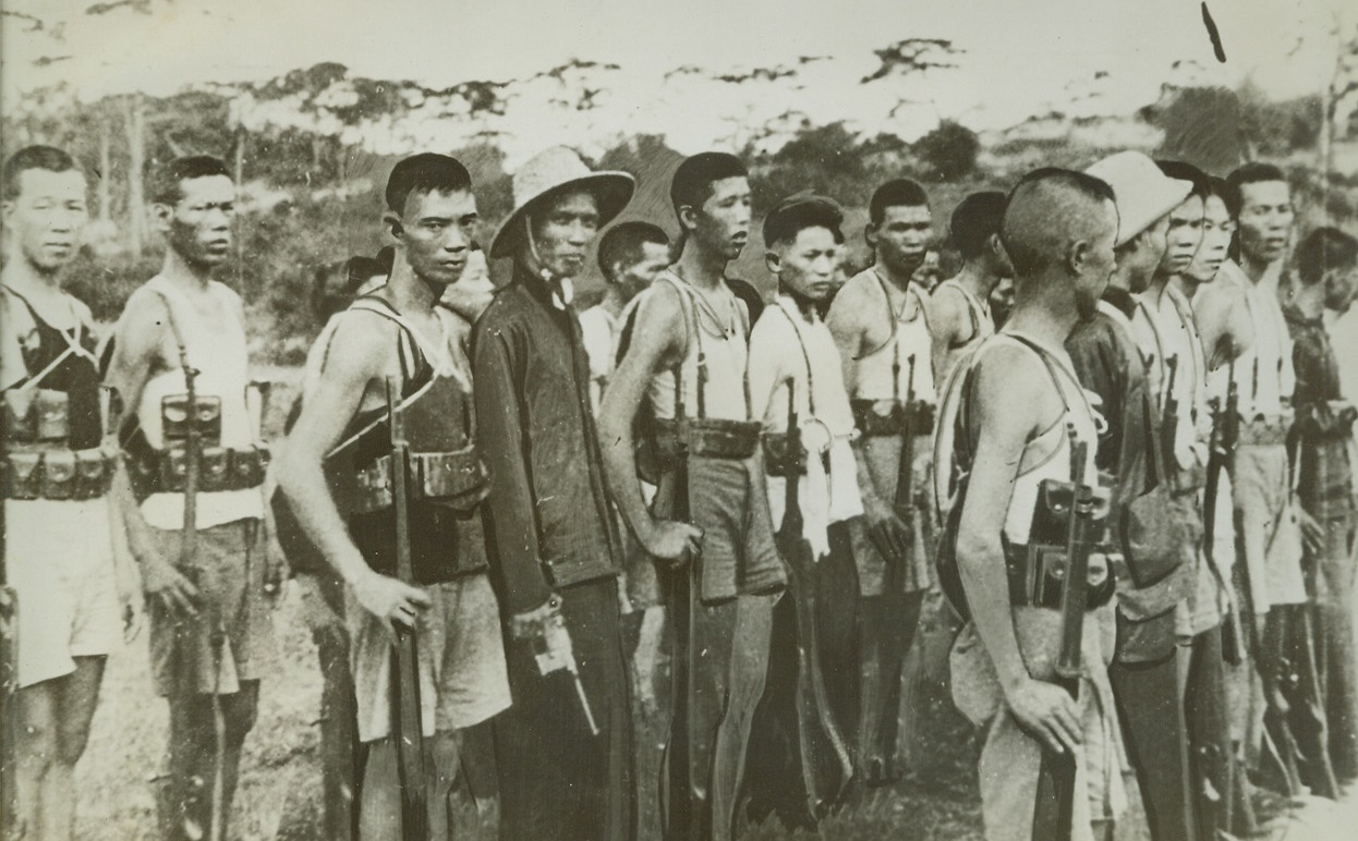 Revenge Detachment, 9/30/1942. Somewhere in China – Chinese guerilla soldiers, recruited from farmers, are getting their revenge against Japs who indiscriminately scourged civilians, hospitals and entire defenceless villages.  United China relief offices have received reports of “revenge detachments,” like the above.  Credit for starting the vengeful groups is given to an old Chinese farmer whose entire family was slain. Credit line (ACME);
