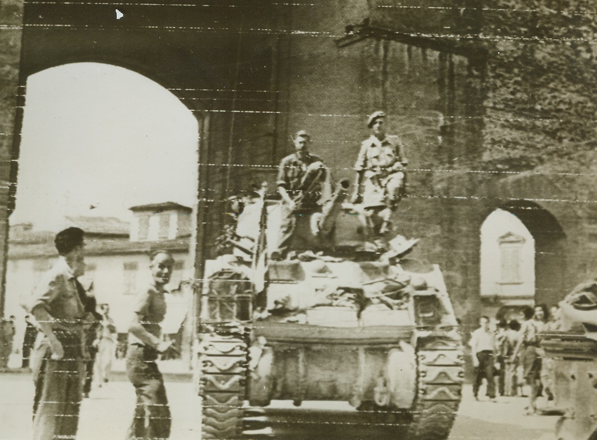 Gateway to Florence, 8/14/1944. FLORENCE, ITALY – Passing through the Porta Romano, a South African tank unit enters the city of Florence, hub of the Germans last defense line in Italy. British 8th Army troops have cleaned out the last Nazi resistance pockets, and AMG officials have taken over. Credit Radiotelephoto from ACME);
