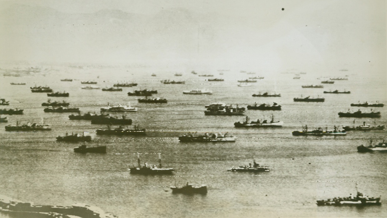Headed for Southern France, 8/15/1944. Flashed to the U.S. today by Radiotelephoto as the invasion of Southern France was announced this photo shows approximately 75 ships assembled at a port in Southern Italy, ready to leave for the new invasion. Credit Line (Army Radiotelephoto from ACME);