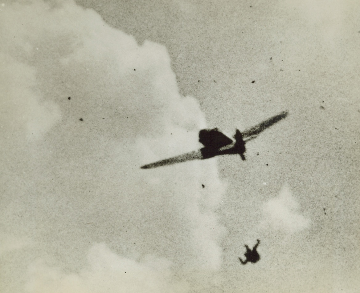 Nazi Hits the Silk, 8/23/1944. Arms and legs all akimbo, a Luftwaffe fighter pilot tumbles earthward, his plane flying on, still level, without him. A U.S. Army 8th Air Force fighter pilot attacked the enemy craft somewhere over France and although the plane seems unharmed, the pilot, unnerved by hits Yank scored, baled out.Credit (USAAF Photo from Acme);