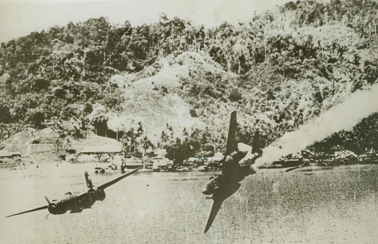 The Last Flight of a Yank Bomber - #1, 8/10/1944. KOKAS, DUTCH NEW GUINEA – In a slow, graceful dive, an A-20 attack bomber heads for the sea on its final flight after being hit by ack-ack bursts. A companion ship at left maneuvers for safety. Smoke streaming from the tail of the wounded craft marks a trail of death, as the ship was too low to permit crewmen to parachute. Both planes were returning from a low-level raid on Jap installations at Kokas, Dutch New Guinea. Credit: USAAF photo from ACME;