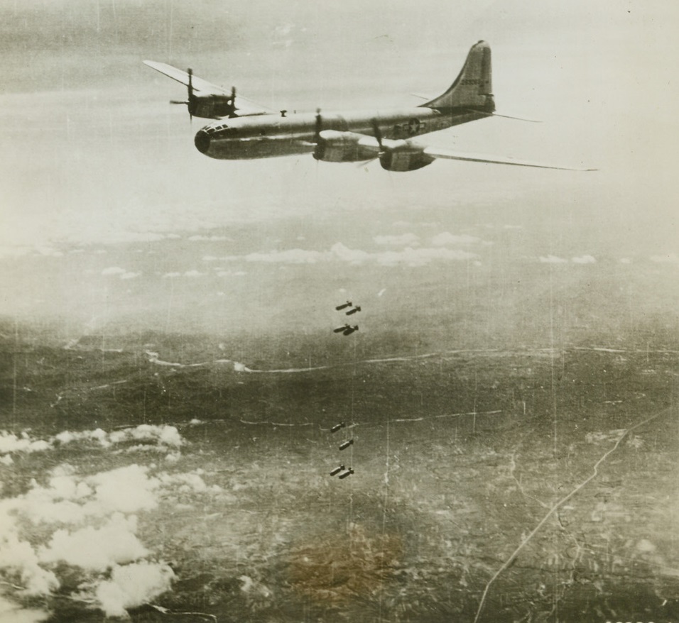 Deadly “Eggs” Drop on Jap Steel Center, 8/29/1944. Anshan, Manchuria – In this, one of the first pictures of the B-29 superfortresses in action over enemy territory, one of the bombers lets loose its load of explosives over the Showa steel works in Anshan in the July 29 raid.  The Showa steel works is the second largest integrated iron and steel plant in the Japanese system, and  a key unit in Japan’s industrial development of Manchuria.  The results of the raid were good, with moderate enemy fighter and anti-aircraft opposition. Credit (official USAAF photo from ACME);
