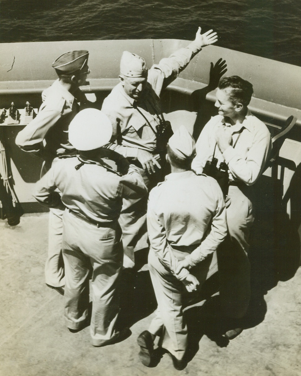 FORRESTAL SEES INVASION OF S FRANCE, 8/24/1944. Getting a first hand account of the workings of an invasion, Sec. of the Navy James Forrestal accompanied the Allied force which landed in Southern France. In this photo the secretary listens as Vice-Adm. H. Kent Hewitt, who was in command of the landing operations, gestures towards the objective while discussing tactics with (left to right) Maj. Gen. A.M. Patch, Jr. Commanding General, 7th Army; Contre Admiral (Rear Adm.) Andre Lemonnier, Commander, French Navel Forces, Mediterranean; and Brig. Gen. G.P. Saville, Commanding General, 12th Tactical Air Command; and Mr. Forrestal. Credit (U.S. Navy Photo from ACME);