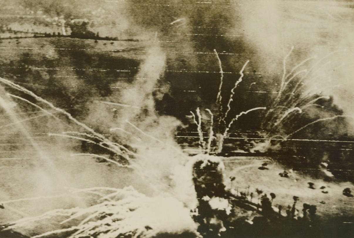 Nazi Ammo Dump Hits the Sky, 8/18/1944. France – A German ammunition dump, north of Falaise, France, blows sky high after a direct hit during a daylight attack by RAF bombers. Credit: British Ministry of Information photo via Army Radiotelephoto from ACME;