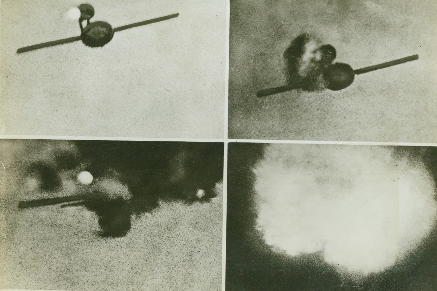 Hitler’s V-1 Goes Kaput, 8/22/1944. England – These photos taken with an automatic camera fitted to a fighter plane flying over England show the death of one of Hitler’s flying bombs—the V-1. At upper left the bomb, in full flight, tears toward its target at four miles a minute. Hit in a vital spot, as shown in upper right, the flying bomb falters and slows down. Smoke pours from its jet mechanism and fuselage. At lower left the weapon is in its death throes. Black clouds of smoke stream and almost completely envelope it. The fire spreads to the explosive war-head and in the last photo of this series, lower right, the bomb explodes harmlessly in a huge glare of light in mid-air. Credit: British Official Photo from ACME;