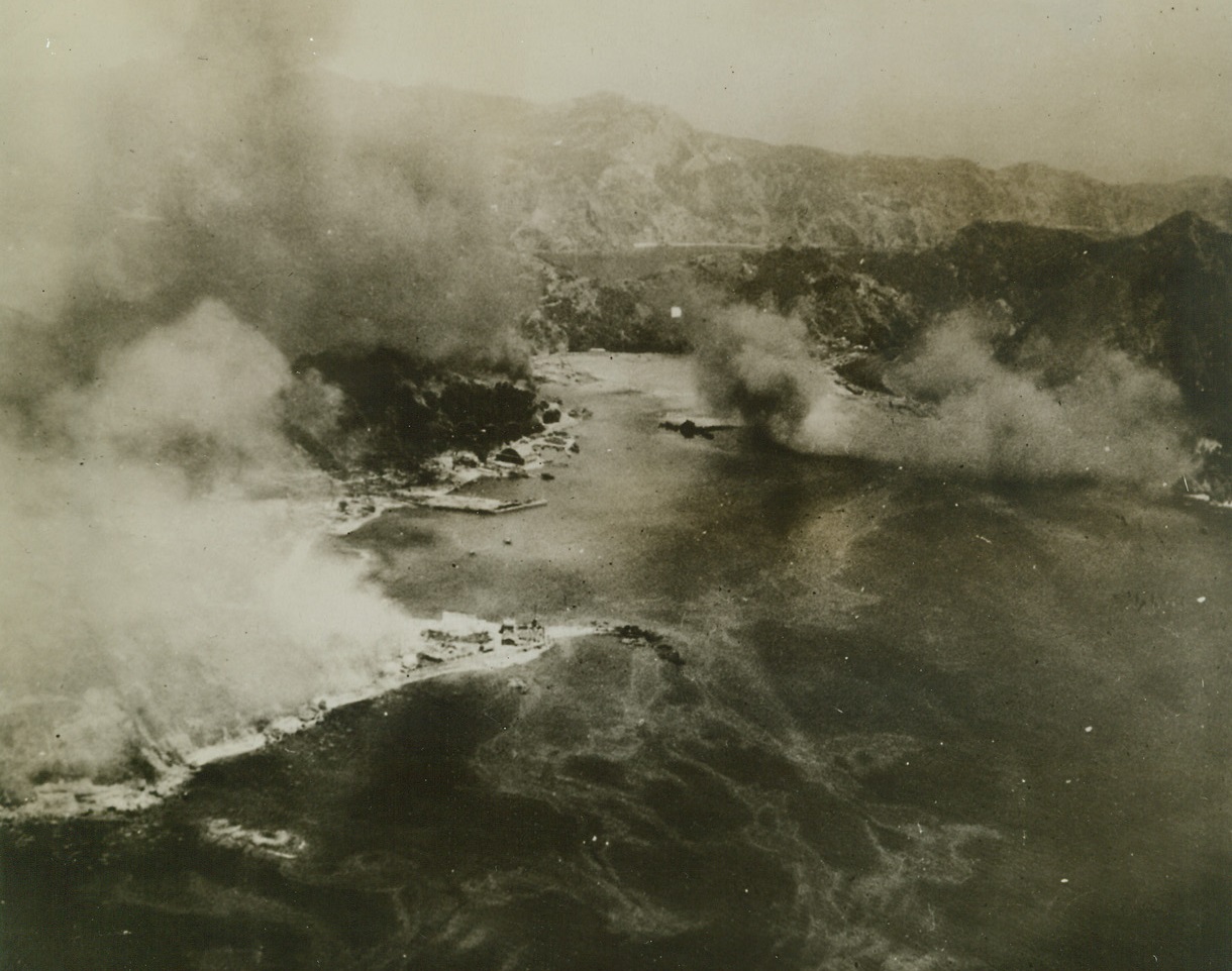 Chichi Jima Blasted by Navy Planes, 9/15/1944. Chichi Jima – A pall of smoke of hides the town area and seaplane base of Chichi Jima in the Bonin islands after Navy carrier-based blasted enemy aircraft, sank shipping, and destroyed military installations in a recent raid.  Islands are only 600 miles from to Tokyo. Credit (U.S. Navy photo from ACME);