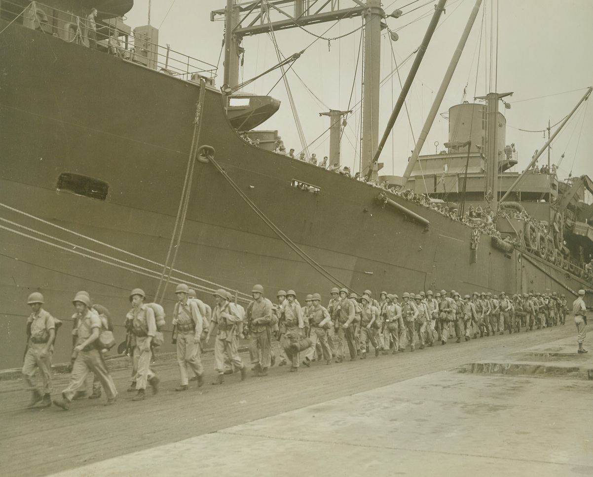 …GUADALCANAL, 2/11/1943. …U.S. Marines leave the troop…that brought them from Guadalcanal…to trucks that will take them to …at a South Pacific base. The hardy Leathernecks left a record which the U.S. Army fighters, who relieved them, will have a hard time equaling.  Credit Line (ACME);