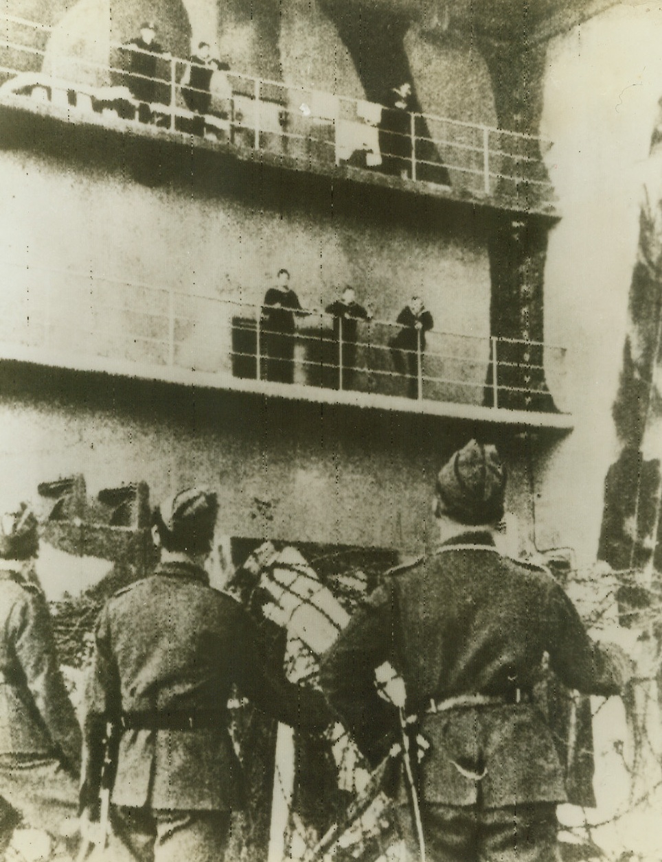 Double Raid Cripples Nazi U-Boat Base, 2/15/1943. Lorient, France – Concrete dugouts for Nazi U-boat crews, such as this one, were smashed by strong formations of RAF four-motored bombers Saturday night in two raids. The Nazi U-boat center was all but knocked out in the furious assault where over 1,000 tons of bombs were hurled and the city was virtually transformed into a sea of spurting flames. This photo was taken from a newspaper page smuggled into London and radioed to New York today. Credit: ACME Radiophoto;