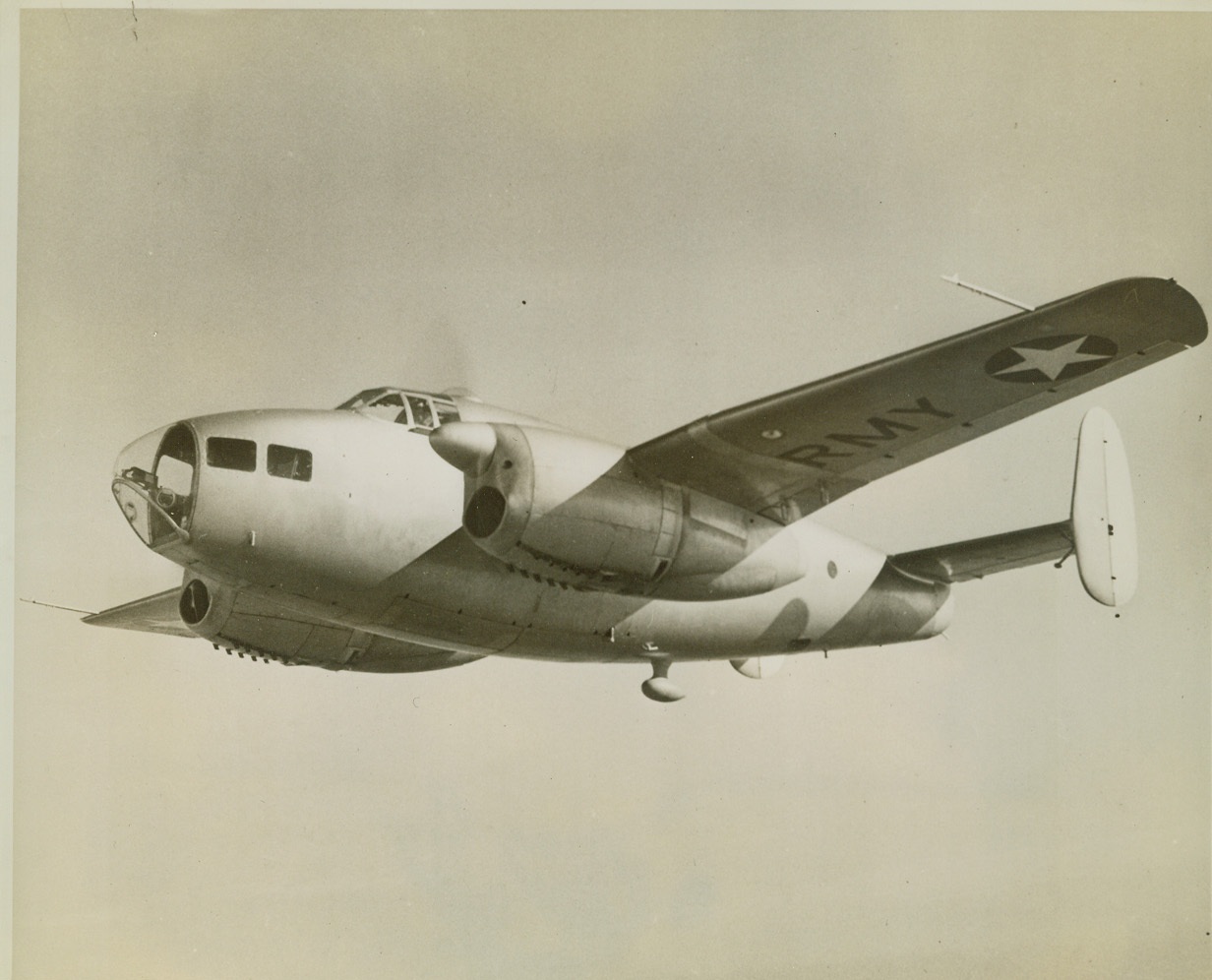 Plywood Training Plane, 2/22/1943. Burlington, N.C.—The only metal used in the Fairchild AT-21 (above) is in the engines, engine supports, instruments and certain other equipment supports. The rest of the five-beater plane is built of plastic bonded plywood. It is in the 200-miles-per-hour class and was designed primarily to train gunner crews to work as a team. It’s made by Fairchild Aircraft, Burlington. Credit: ACME;