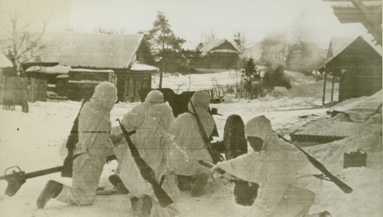 Red Anti-Tank Crew Moves Up, 3/10/1943. RUSSIAN FRONT—A Russian anti-tank crew moves forward to a new position on a snow-covered section of the front. Smoke from a bursting shell can be seen (right background). These anti-tank guns have been key weapons in the recent successful offensive by Red forces against the Germans. Passed by censors.Credit: ACME Radiophoto;