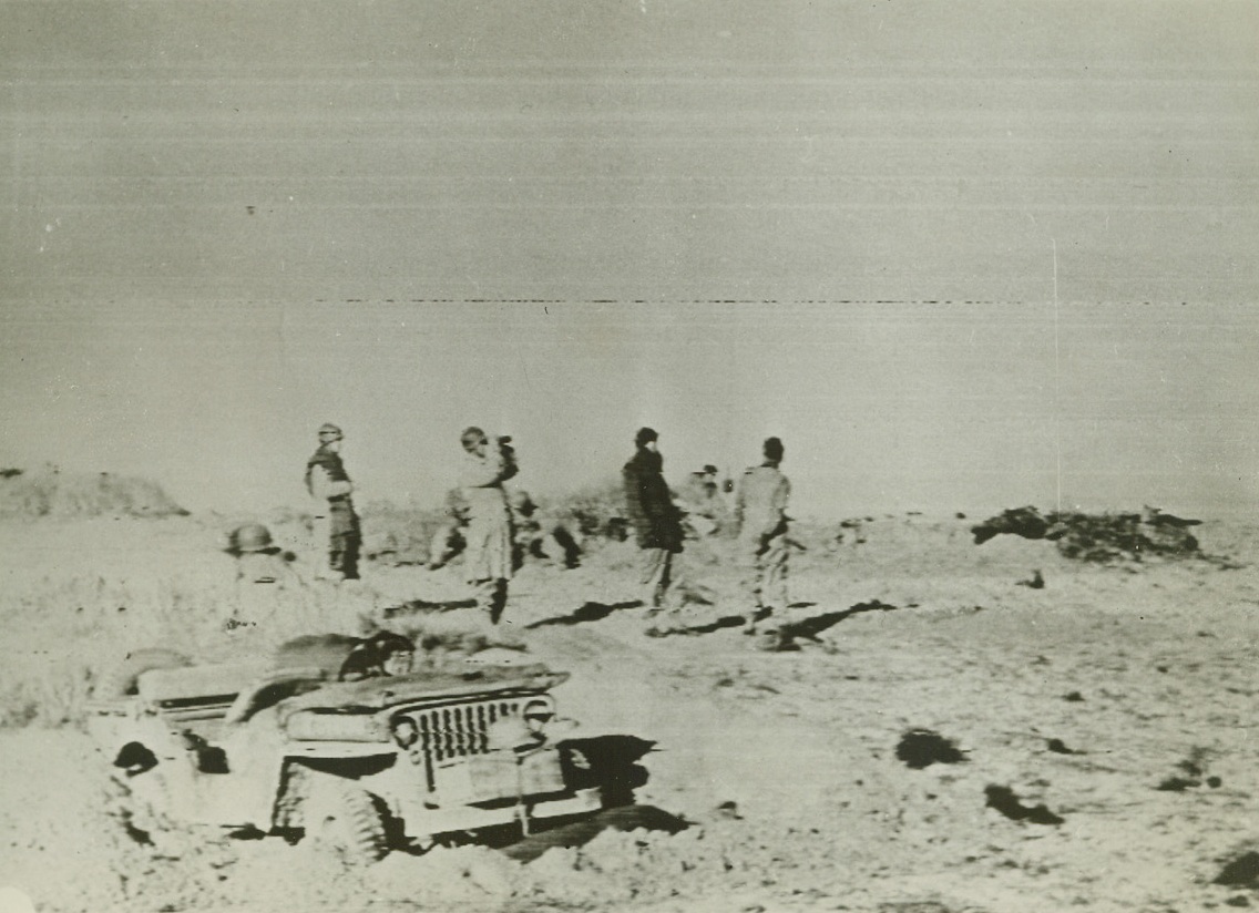 New Radio Telephoto Service Opens, 3/22/1943. Washington, D.C. – This photo, taken during the allied victory at Gafsa, on the North African front, has just been received over the newly established Signal Corps radio telephoto.  The new service links directly the War department in Washington, with the headquarters of Gen. Dwight D. Eisenhower in Algiers, for two-way radio transmission.  The picture shows allied officers observing the progress of the battle for Gafsa, from a forward position. Credit line (U.S. Army Signal Corps);