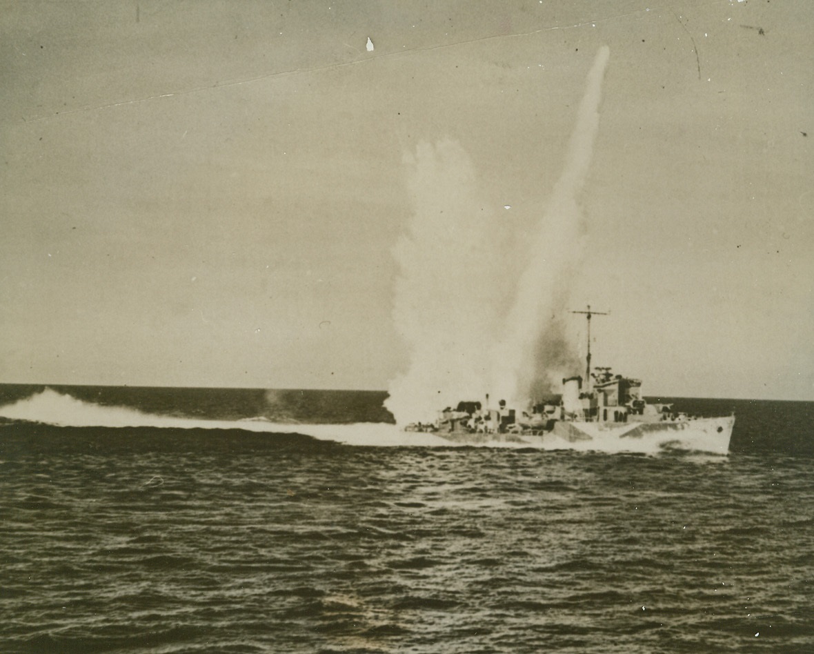 Look Out Below!, 3/1/1943. Columns of water shoot up from an exploding depth charge, which this British Destroyer has just put overboard during an attack on an enemy submarine, “somewhere on the high seas.” (Passed by Censors) Credit: ACME;