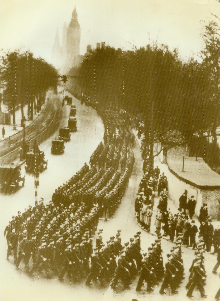 American Airmen March, 3/11/1943. London -- American Air personnel lead an Allied procession along the Thames embankment in London this morning as part of the “Wings for Victory” ceremony in which activities of both British and American Airmen were extolled. Credit: ACME;