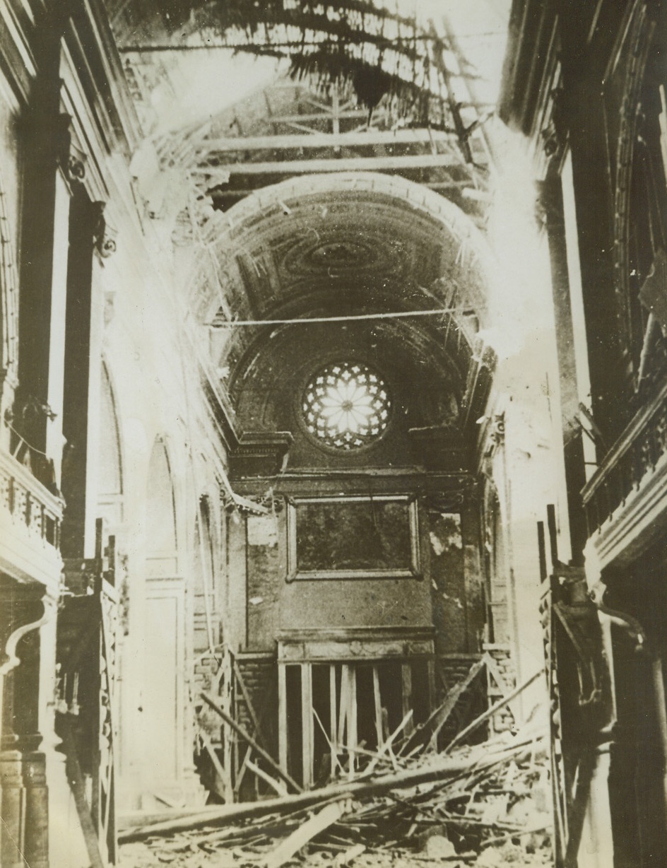 Palermo Church Hit by Allied Bombs, 6/29/1943. SICILY—Allied bombers, attacking Palermo, according to the caption on this picture received from a neutral source. Although our airmen have pledged themselves to steer free of the Vatican should they bomb Rome, it is not always possible to pick out industrial targets in crowded war centers. Credit: ACME.;