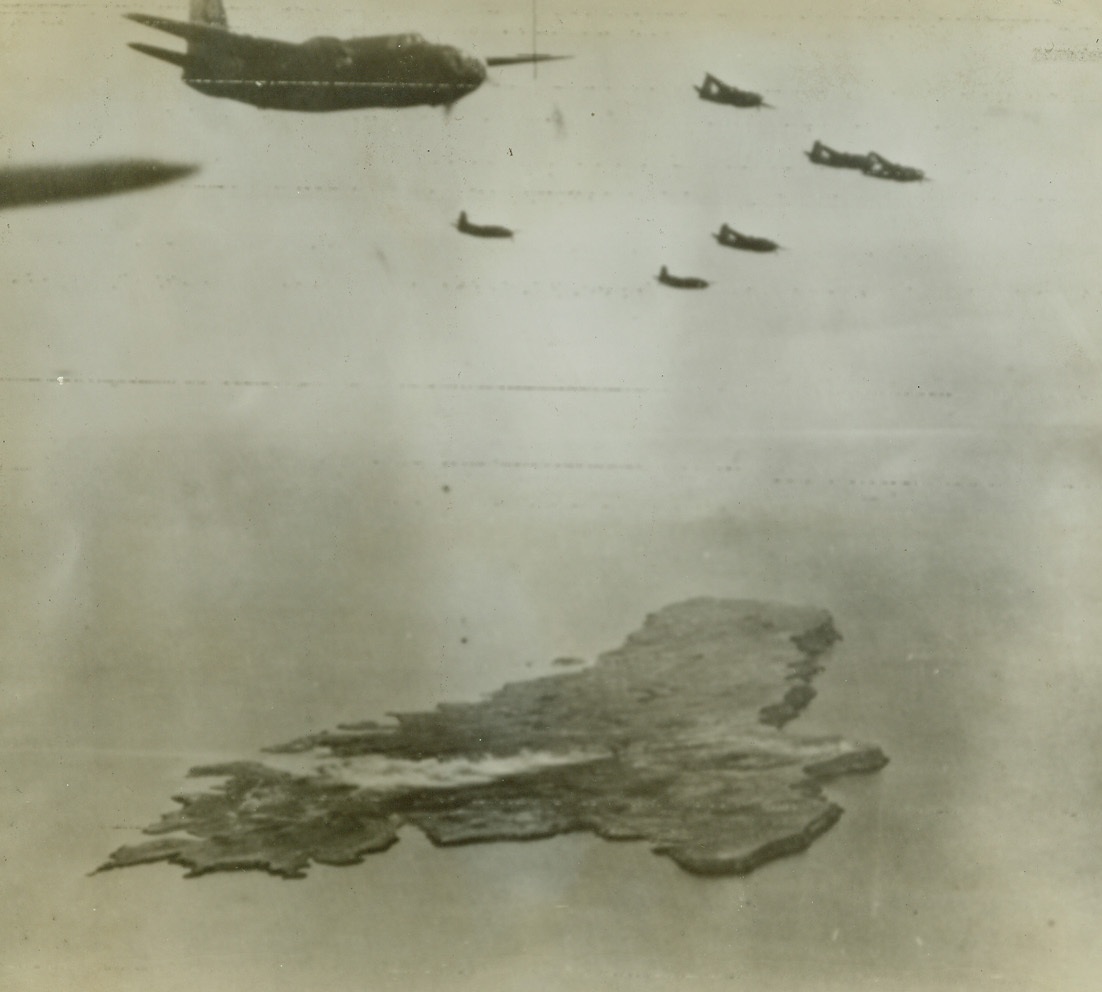 Tiny Stepping-Stone to Italy, 6/15/1943. RAF Boston Bombers roar over Lampedusa, the tiny bleak island off Italy which fell to the Allies on June 12. Wave of bombers hammered the Italian isle into submission while ships of the British Mediterranean fleet bombarded Lampedusa’s only harbor and later supported Allied landing forces. Mitchells, Bostons, Baltimores and Lightenings and Warhawks lambasted the small island until a white flag of surrender flapped an invitation to invasion. Credit (Acme Radiophoto);