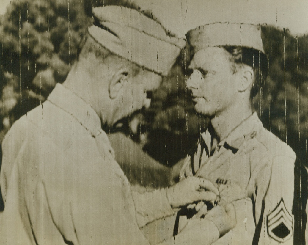 Army Photographer’s Heroism Recognized, 6/30/1943. North Africa: - The first U.S. Army Signal Corps enlisted man to be awarded the Silver Star in North Africa was Staff Sergt. Lorenzo Alcock, of Los Angeles, Calif. (right), who receives the decoration from Brig. Gen. J.V. Matejka, Chief Signal Officer. Sergeant Alcock, an Army pictorial service cameraman, received the award for bravery under fire with utter disregard for his own personal safety while photographing the action during the landing operations in the African invasion. Credit (U.S.Army Signal corps radio telephoto from ACME);