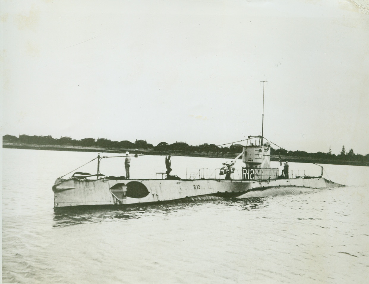 Submarine R-12 Lost, 6/26/1943. Lost as the result of an accident which occurred during training exercises, the U.S. submarine R-12 took several men and officers down with her when she sank off the East Coast recently. The depth of the water makes it impossible to salvage the vessel and all hope for recovery of the bodies of the missing personnel has been abandoned. Although no figures on casualties were released, the R-12 carried a normal complement of 28 officers and men, some of whom survived. Credit: (Official U.S. Navy Photo from ACME);