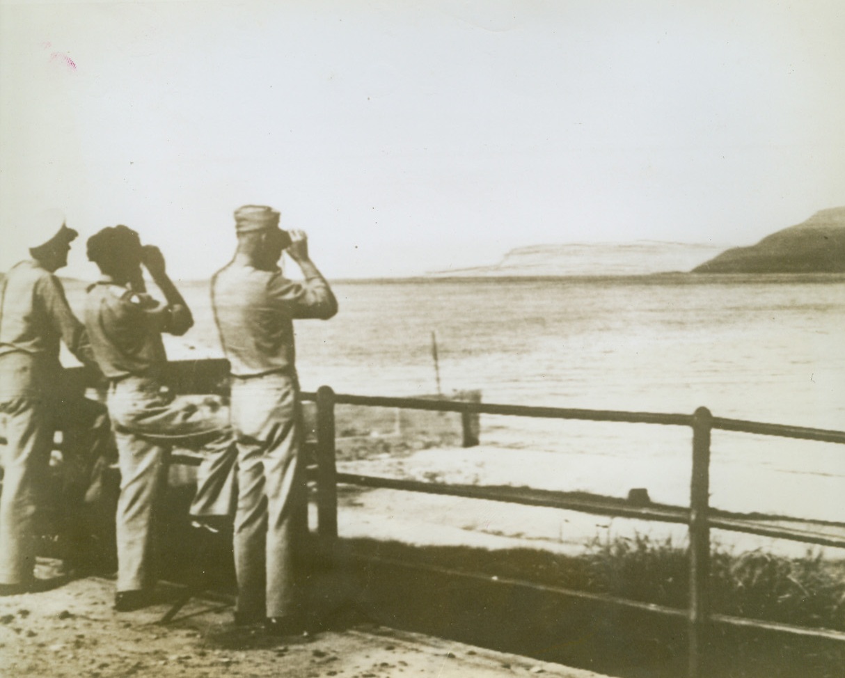 Greatest Show on Earth, 8/31/1943. MESSINA, SICILY – General Dwight D. Eisenhower, Commander-in-Chief of Allied Forces, and General Sir Bernard L. Montgomery, Commander of the British Army, focus their binoculars on the 1943 version of “The Greatest Show on Earth.” They are observing shelling of the Italian mainland from U.S. gun positions at Messina. Left to right: Commander Harry Butcher, Naval Aide to Gen. Eisenhower; General Montgomery; and General Eisenhower. Credit Line (U.S. Signal Corps Radiotelephoto – Acme);