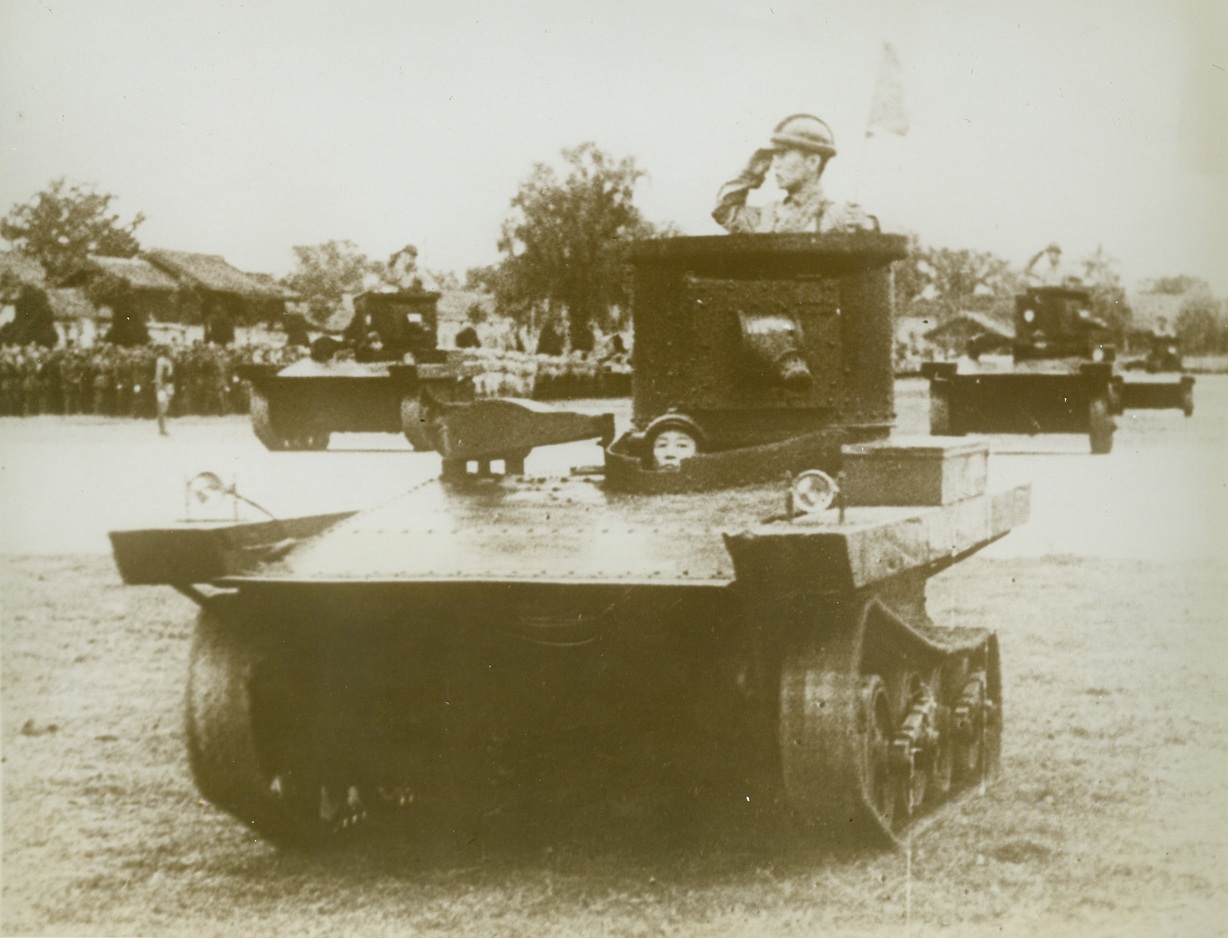 Chinese Tanks On Parade, 1/6/1943. CHANGTU, CHINA—Light Tanks of the Chinese Army pass in review in a parade held in Changtu. The parade was held in commemoration of the 31st anniversary of the Chinese Revolution and the birth of the Chinese Republic. Credit:  ACME;