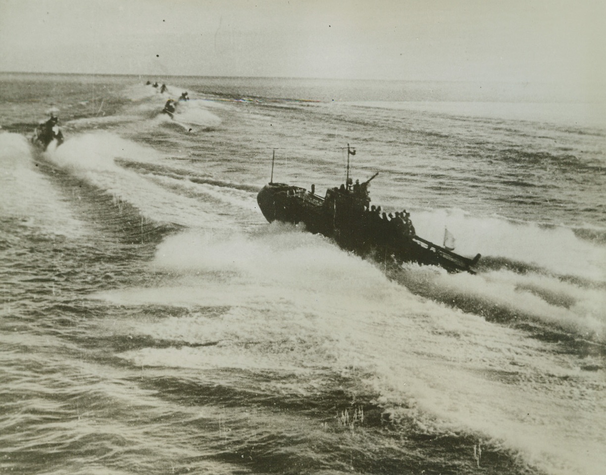 On Sea as on Land, 1/14/1943. SOMEWHERE ON THE RUSSIAN COAST - With the news of Russia's land offensive looming large on the war news horizon, very little attention has been given to Russian offensive on the seas surrounding her coast. Photo shows torpedo boats setting out-on a fighting assignment from their base. Latest reports from the Sovient front indicate that Red Army forces have broken through a gap in Nazi defenses in the lower Don sector.;