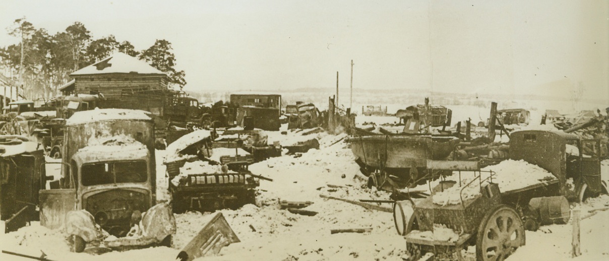 Graveyard of Axis Vehicles, 1/14/1943. STALINGRAD FRONT - This huge scrap pile is all that remained of a German transport column, smashed by Russian forces northwest os Stalingrad. Dispatches today indicate that a gap has been forced in German defenses in the lower Don sector, and that Red troops are pouring through the breach.;