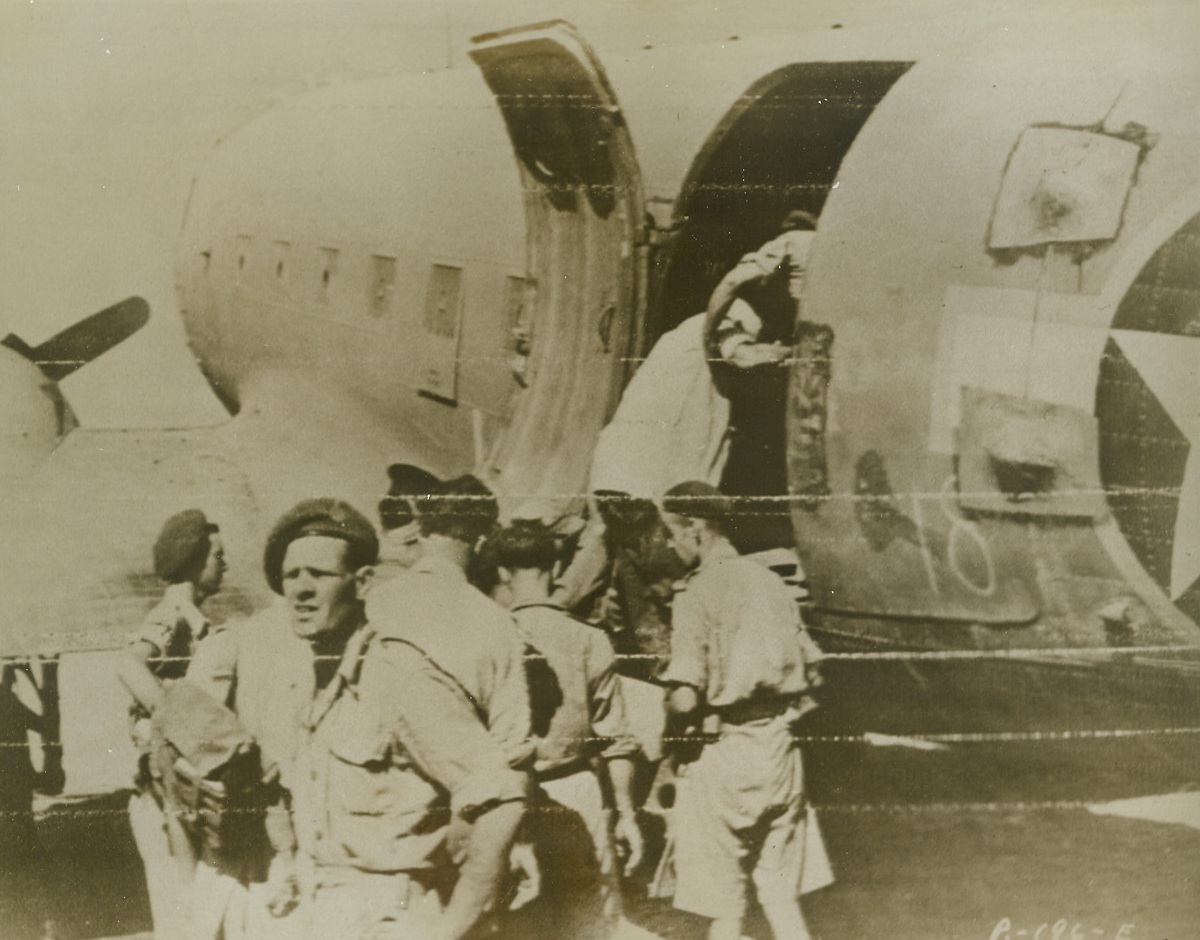 Evacuating Wounded, 9/20/1943. ITALY – Wounded in fighting on the Italian mainland, American soldiers are evacuated by N.A.A.F. planes. The planes maintain a shuttle service, bringing supplies and troops to the front and carrying the wounded back on return trips. Credit (Signal Corps Radiotelephoto from Acme);