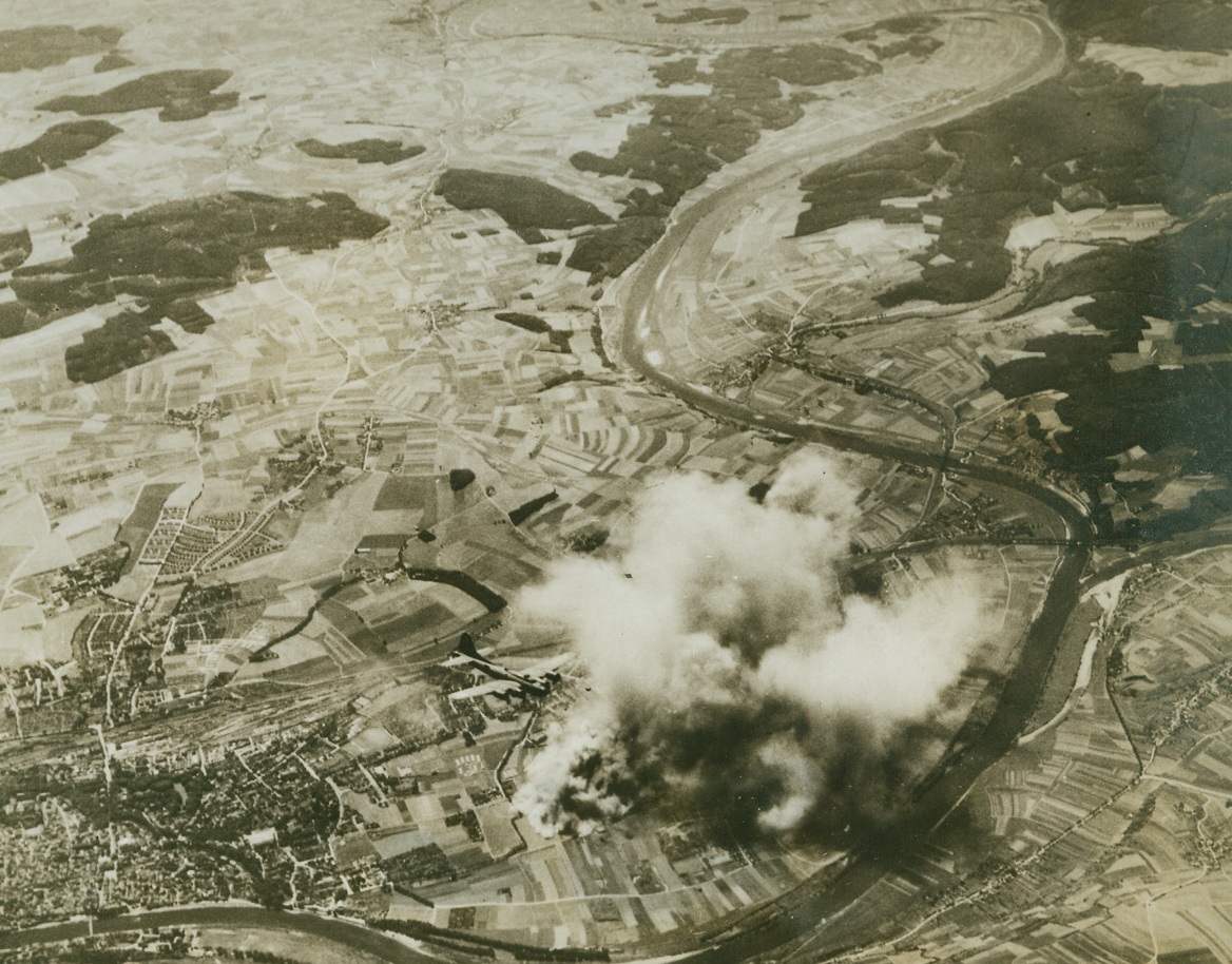 Factory on Danube Hit, 9/7/1943. GERMANY – Tucked away in a bend of the Danube near the Austrian border at Regensburg, the Germans had built a mammoth aircraft factory which produced their latest type fighter, the ME. 109G. On August 17th, large formation of Flying Forts of 8th Air Force attacked the plant and severely damaged it. Photo was made from bombers during height of attack. Germans lost 140 fighters while Americans lost 23 Forts.Credit Line (ACME);