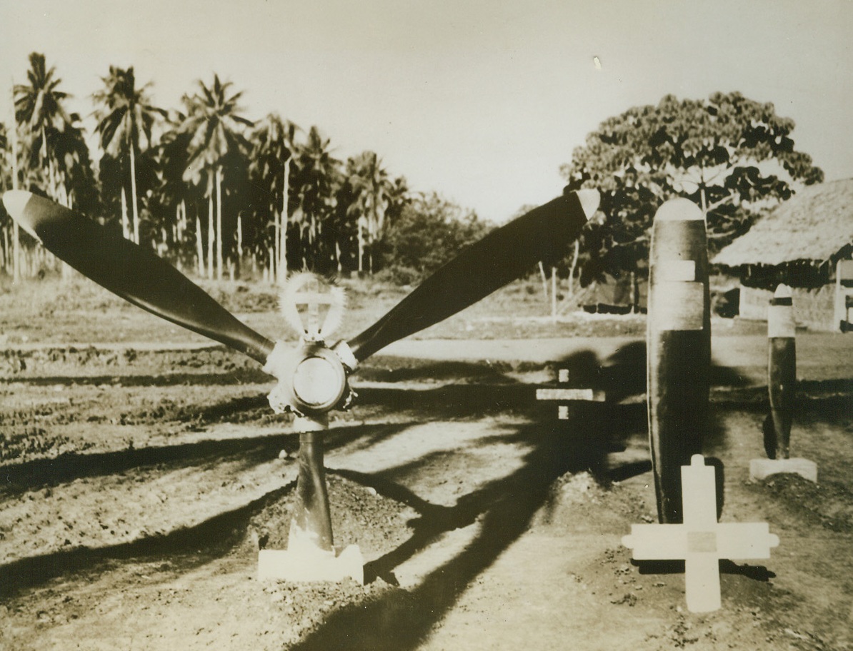 Graves Of Heroic U.S. Fliers, 9/29/1943. Solomon Islands – These propeller blades mark the last resting places of American aviators who died in defense of their country in fighting over Guadalcanal and the Solomon Islands. Today, in the southwest Pacific, their buddies are extracting a terrible toll in  Jap planes and have captured virtual superiority in the air. 9/29/43 Credit Line (U.S. Navy Photo From ACME);