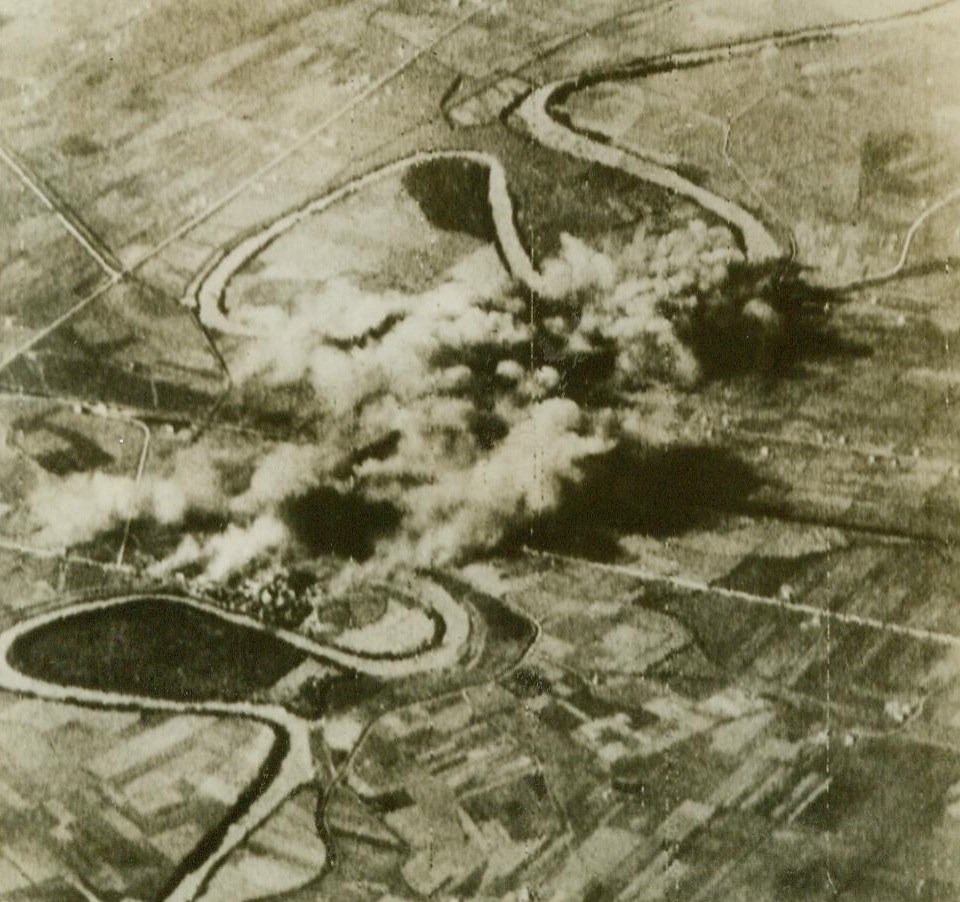 Bombs Hit Strategic Point Near Naples, 9/15/1943. U.S. Army Air Forces bombs fall on Concello, Italy, during the raid of September 9th. Twenty-five miles northwest of Naples, Concello lies on the winding Volturno River. Flying fortresses went after two highway and one railroad bridge spanning the river as they sought to cut vital communications, thereby American 5th Army below Naples. The railroad bridge suffered direct hits, while the other two were badly damaged 9/15/43 Credit Line (U.S. Army Air Forces Photo Via Signal Corps Radiotelephoto From ACME);