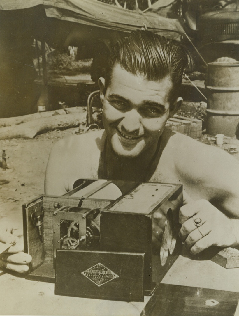 Just What the Dodgers Ordered, 9/19/1943. New Georgia Island—Here’s the gadget that the Brooklyn Dodgers have been looking for an automatic fly catcher.  Marine raider Tommy Dougan, of Memphis, Tenn; , picked up the Jap-manufactured Thingamajig when the Yanks moved into Bairoko, New Georgia.  A cylinder, motivated by clockwork, slowly rotates and imprisons flies, attracted by honey or syrup, in an escape-proof screened chamber. Credit line (ACME);