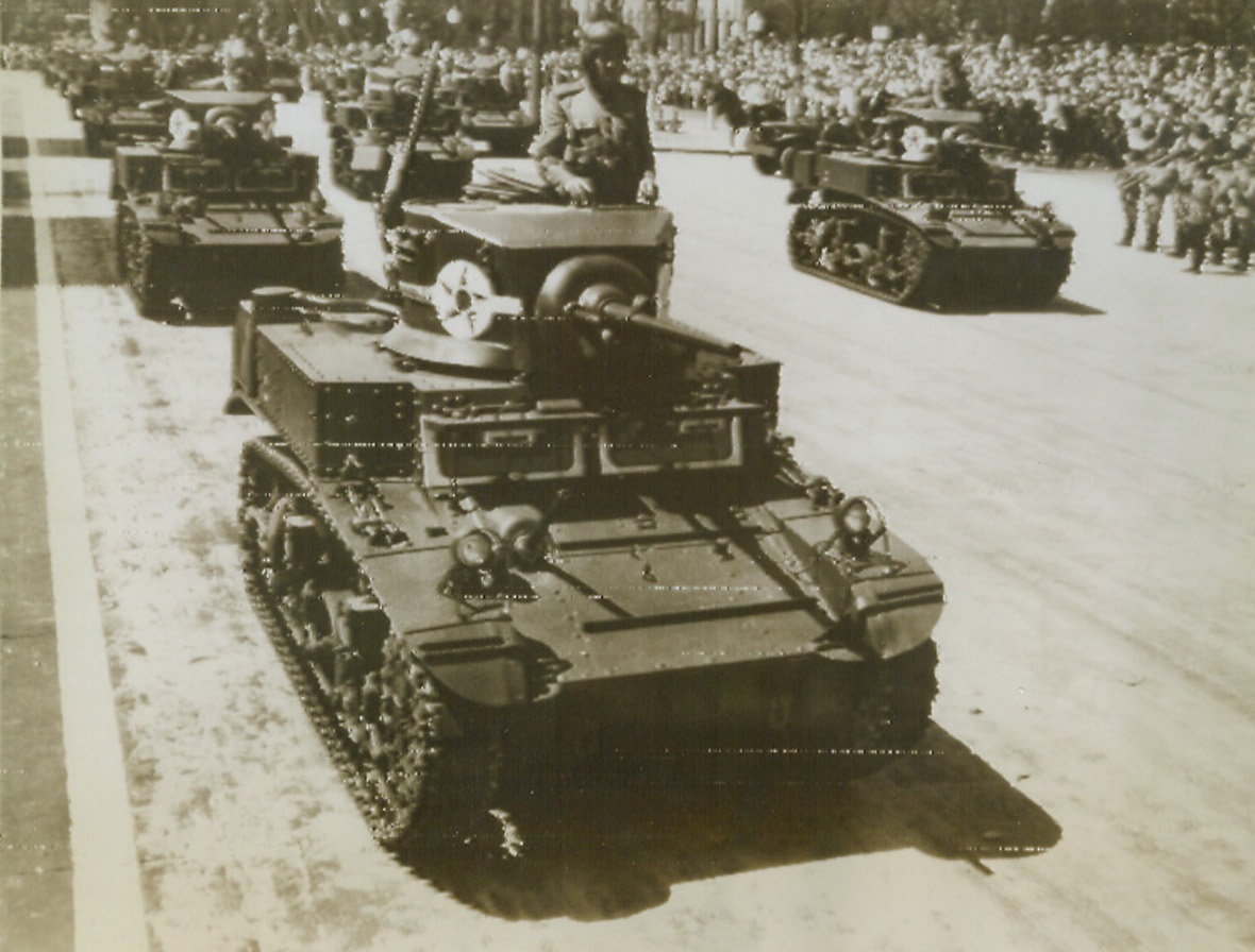 Brazil Celebrates 122 Years of Independence, 9/7/1943. Rio de Janeiro—Twenty-eight ton tanks of a Brazilian mechanized division pass the Ministry of War building in Rio de Janeiro during the giant parade of 50,000 troops to celebrate the nation’s Independence Day. This photo is one of the first to be transmitted over the direct radio-photo service between Rio and New York just opened by the Mackay Radio and Telegraph Corporation.Credit: ACME radiophoto.;