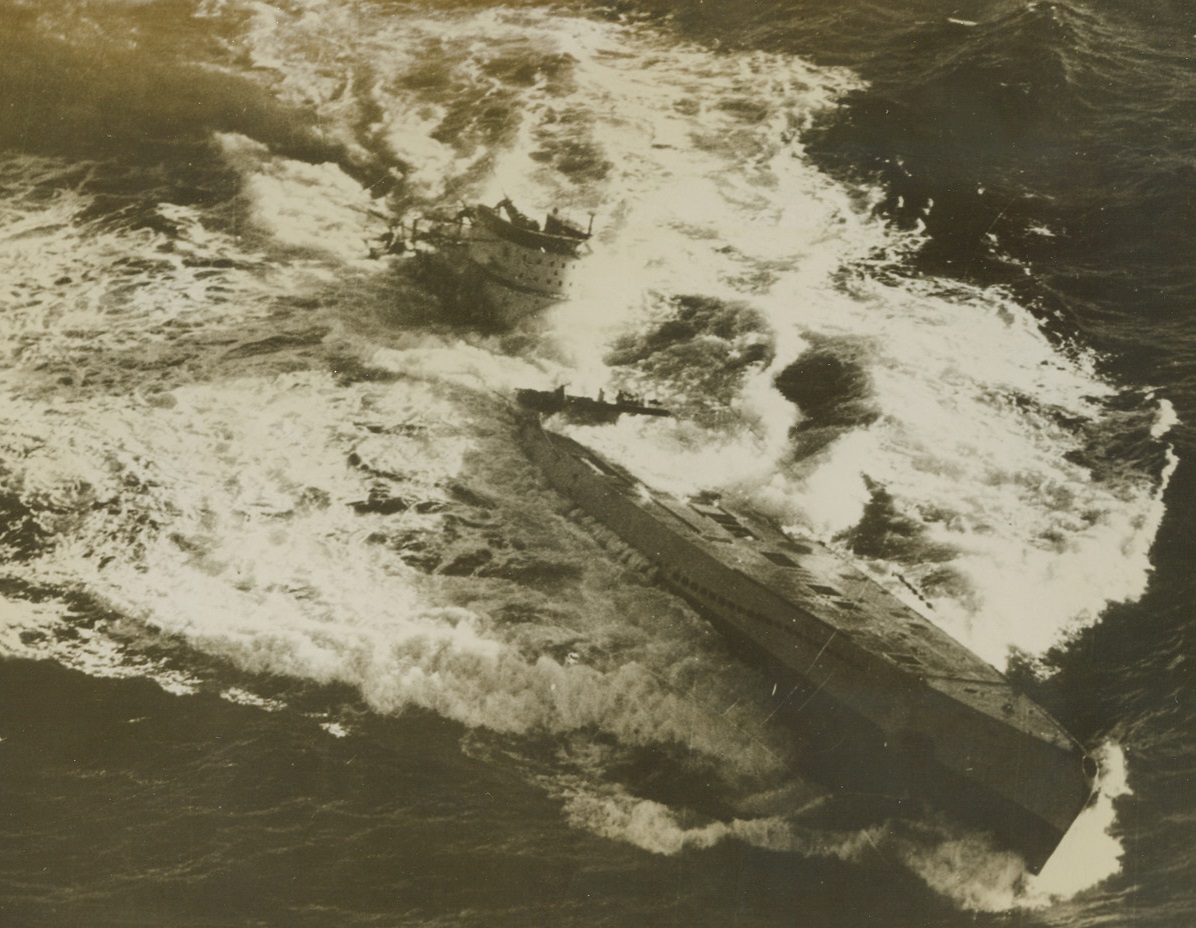 U.S. Navy Plane Sinks 3 Nazi Subs, 9/28/1943. WASHINGTON, D.C. - One, lone U.S. Navy Grumman Avenger (TBF) torpedo bomber flying from an escort carrier in the Atlantic, has made history by definitely sinking 3 Nazi U-Boats in 4 days and damaged another, according to announcement in Washington today. Lt. Robert P. Williams, USNR, and his two-man crew not only escaped unscathed in the attacks, but produced excellent pictoral evidence of the "kills". ...during the Navy plane's fourth attack, a Nazi sub begins to settle by her shattered stern, while surviving members of her crew cower in the shadow of the conning tower. This photo was made by an escorting Grumman Wildcat fighter.;