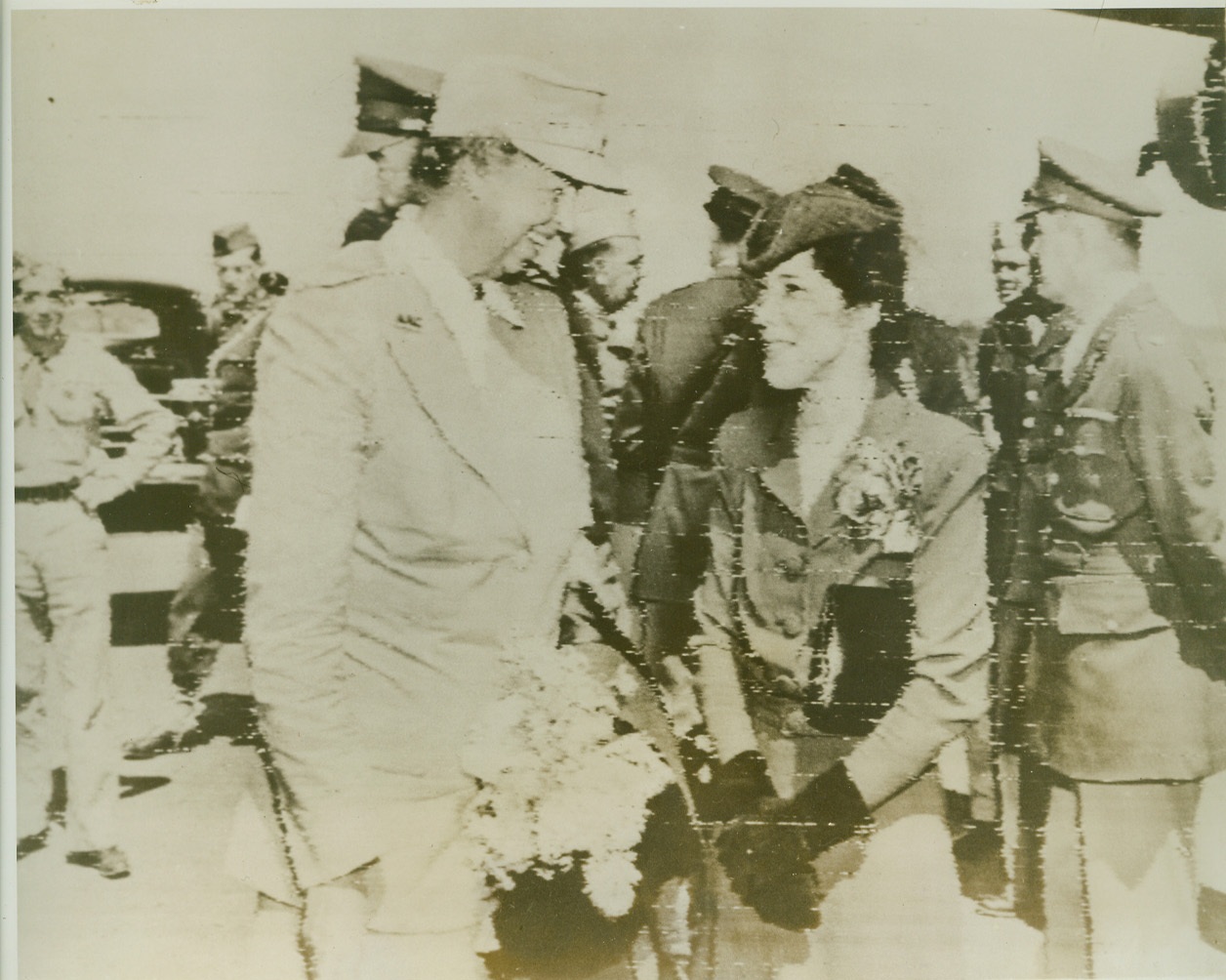 Mrs. Macarthur Greets Mrs. Roosevelt, 9/20/1943. Somewhere in South Australia—The wives of two of America’s great leaders met when Mrs. Douglas Macarthur (right) greeted Mrs. Franklin D. Roosevelt when the latter arrived at an airport somewhere in South Australia. Credit: Signal Corps radiotelephoto from ACME.;