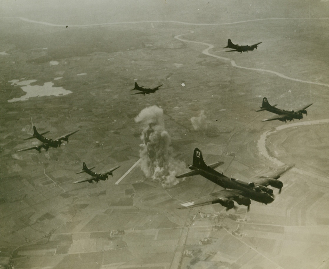 Forts Destroy Focke-Wulf Plant, 10/22/1943. MARIENBURG, GERMANY – Columns of smoke rise from the ruined Focke-Wulf aircraft plant at Marienburg as Flying Fortresses of the 8th Air Force Bomber Command turn away from their target after the raid of October 9th. German defenses were caught napping when our Forts visited the giant plant and virtually destroyed it. Credit (U.S. Army Air Forces Photo via OWI – ACME);