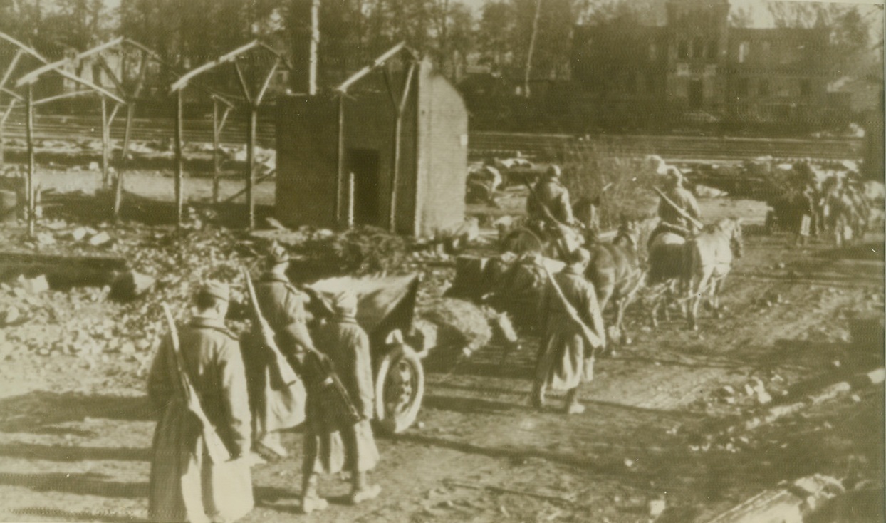 Red Army Pushes Through Roslavl, 10/14/1943. ROSLAVL – Soviet artillery moves through the town of  Roslavl, and important German strongpoint in the Mogilev area, which was captured by the Red Army after the Nazis put up a stiff resistance. Latest reports on the Red Army indicate the Soviet troops fought their way back into Gomel, breaking the back of the German defense line, while the bloodiest battle of the war raged near Kiev.Credit: (ACME Radiophoto);
