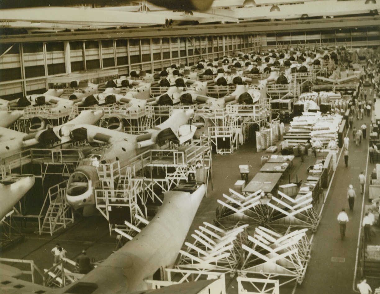 Where Mariner Patrol Bombers are Built, 10/4/1943. Baltimore, MD. - Here is a view along the final assembly line at the Glenn L. Martin plant in Baltimore, where huge Martin PBM-3 Mariner Patrol Bombers are built. (Passed by U.S. Navy Censors). Credit: ACME;