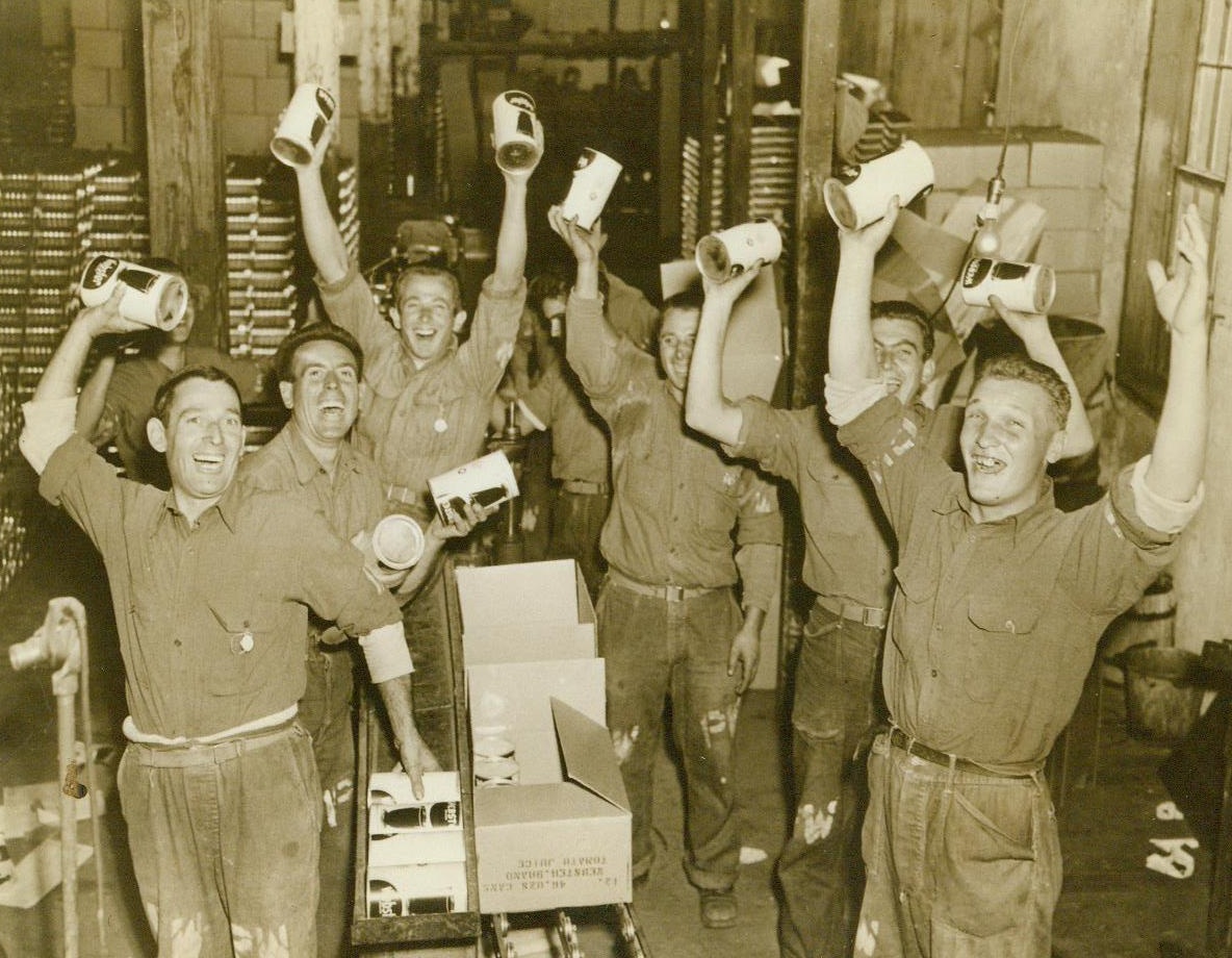 They'd Like To Can Hitler, 10/14/1943. Rochester, N.Y. -- A group of Italian war prisoners working at the Webster Canning Company Plant receive the news of Italy's Declaration of War on Germany with wild, joyful whoops. The prisoners, who will continue their jobs at the canning company, plunged into their work with new enthusiasm when they learned that Italy was out to get Hitler 10/14/43 (ACME);