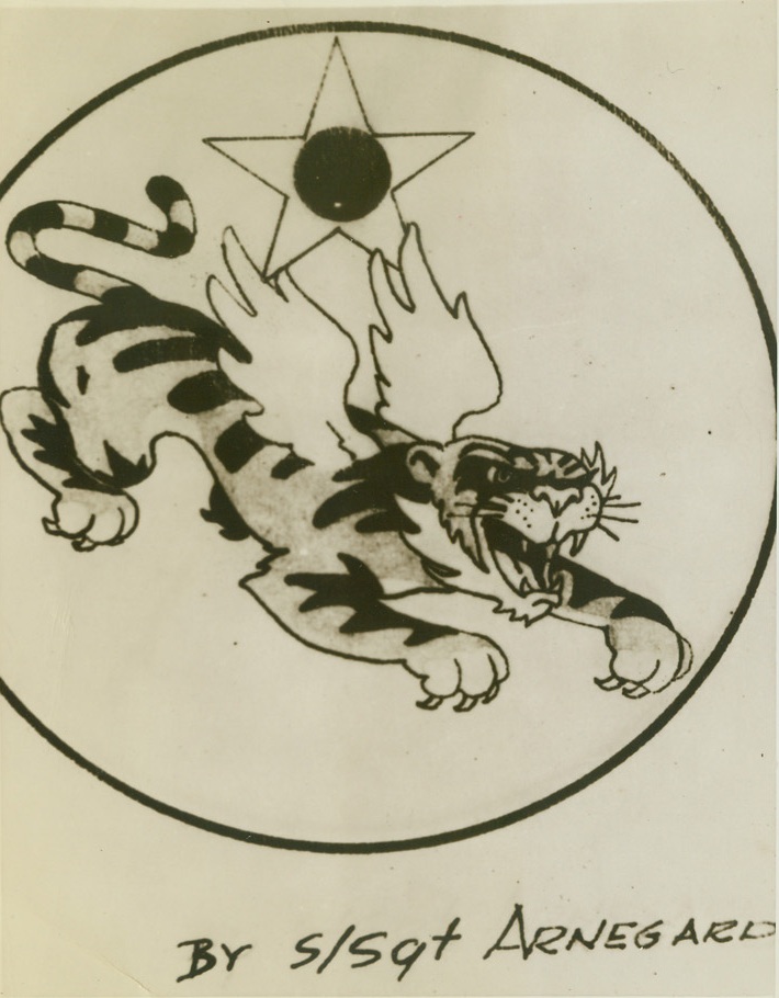 INSIGNIA OF HEROES, 11/26/1943. Here is the new insignia of the U.S. 14th Air Force, serving in China under Maj. General Claire L. Chennault. Designed by S/Sgt. Howard M. Arnegard of Hillsboro, N.D., the patch shows a winged, rampaging Bengal Tiger, topped by the star of the U.S.A.A.F. The new insignia soared over Japan yesterday (Nov. 25th) when American and Chinese bombers and fighters paid a destructive visit to the Jap Airdrome at Shinchiku, on Formosa. Credit: OWI Radiophoto from ACME;