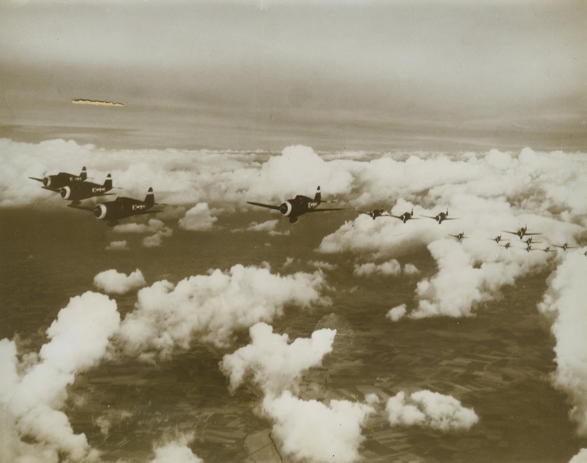 Fighting Pals of the Forts, 11/10/1943. ENGLAND -- Winging through the wild blue yonder with our giant Flying Forts, little P-47 Thunderbolt fighters fill a vital and dangerous though glamorless job. Accompanying the big planes on a mission over Hitler's Europe, the little fighters are entrusted with the job of keeping enemy fighters far away from the Forts. It is not their job to seek dog fights. This series gives keen insight into the work of these men at a Thunderbolt station somewhere in England. New York Bureau Winging through clusters of puffy clouds, a formation of fighters sets out on a mission. The Thunderbolts sail through the skies at a speed of 250 miles per hour and better. Credit:--WP--(ACME);