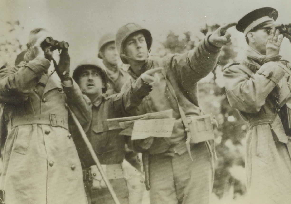French Leader at Front, 11/3/1943. ITALY – Gen. Henri Giraud, military leader of the fighting French (left), looks through glasses at positions pointed out by Allied officers near the front line. Credit (U.S. Signal Corps Radiotelephoto from ACME);