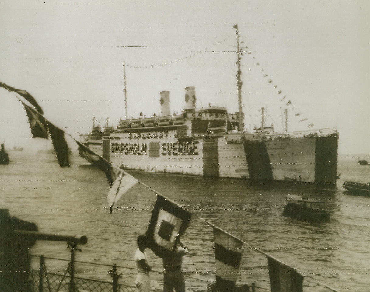 1,500 Americans Arrive “Home” from Japan, 11/15/1943. Rio De Janeiro – The nightmare of Japanese internment camps is over for 1,500 citizens of North and South America who arrive at Rio De Janeiro aboard the Swedish repatriation ship the Gripsholm.  The mercy vessel is enroute to New York from Mormugao, Portugese India.Credit (CIAA radio photo from ACME);