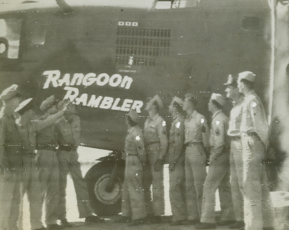 “Rangoon Rambler” Heads for Home, 11/9/1943. This photo, flashed to New York by radio today from “somewhere in Southeast Asia”, shows Maj. Gen. George E. Stratemeyer, U.S. Air Commander in Southeast Asia, bidding bon voyage to the crew of the consolidated B-24 Liberator bomber “Rangoon Rambler”, which is on its way back to the United States on tour.  The members of the crew, each having been awarded the Air medal and the Distinguished Flying Cross, average 400 combat hours apiece.  Left to right, are: Gen. Stratemeyer; Capt. Raymond C. Pato, Phoenix, Ariz., pilot; Lt. Guy Spotts, Williamsport, PA.; Lt. Robert P. Currie, Big Springs, Tex., Sgt. Adolph Scolourino, Providence, R.I.; Sgt. Edward M. Salley, Houston, Tex.; Sgt. John E. Craigie, West Haven, Conn.; Sgt. Joseph E. Willis, Augusta, Ark.; Sgt. Ferdinand Knechtel, Ellwood City, Pa.; Capt. Gordon H. Wilson, Covington, KY.; and Sgt. Carl L. Parks, of Antigo, Wis.Credit Line (10th Air Force photo via OWI from ACME);