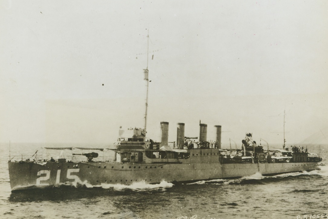 Destroyer “Borie” Sinks in the Atlantic, 11/10/1943. Washington, D.C.—The Navy Department today (Nov. 10th) announced the loss of three destroyers, among them the 190-ton Borie, an old World War I four-stacker. The vessel received mortal wounds as the result of ramming and sinking a German submarine in the Atlantic, and finally had to be sunk by an American carrier bombing planes. Credit: ACME.;
